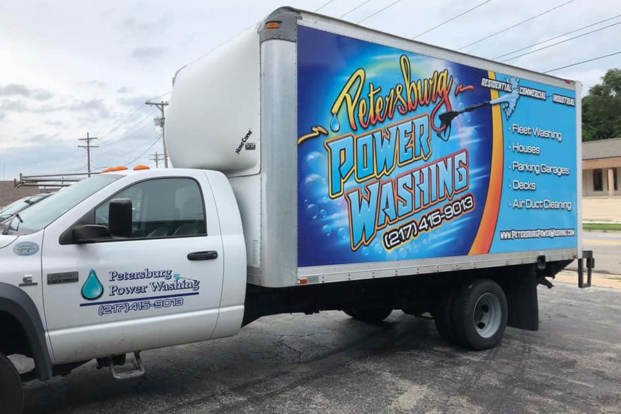 A commercial vehicle in Springfield, IL that belongs to Petersburg Power Washing and offers semi-truck and commercial car power washing services.
