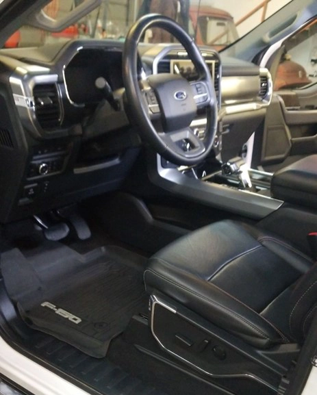 The view of the driver’s side of a Ford F-150 that was detailed by Petersburg Power Washing in Springfield, IL.
