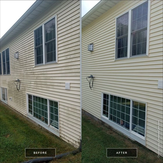 This is a before and after picture of part of the exterior of a house in Petersburg, IL that was power washed by Petersburg Power Washing of Springfield, IL.